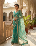 Light firozi net saree with katdana and sequin work Chandni Chowk festive wear